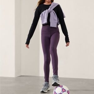Gently used Purple Athleta Stash your Treasures tights